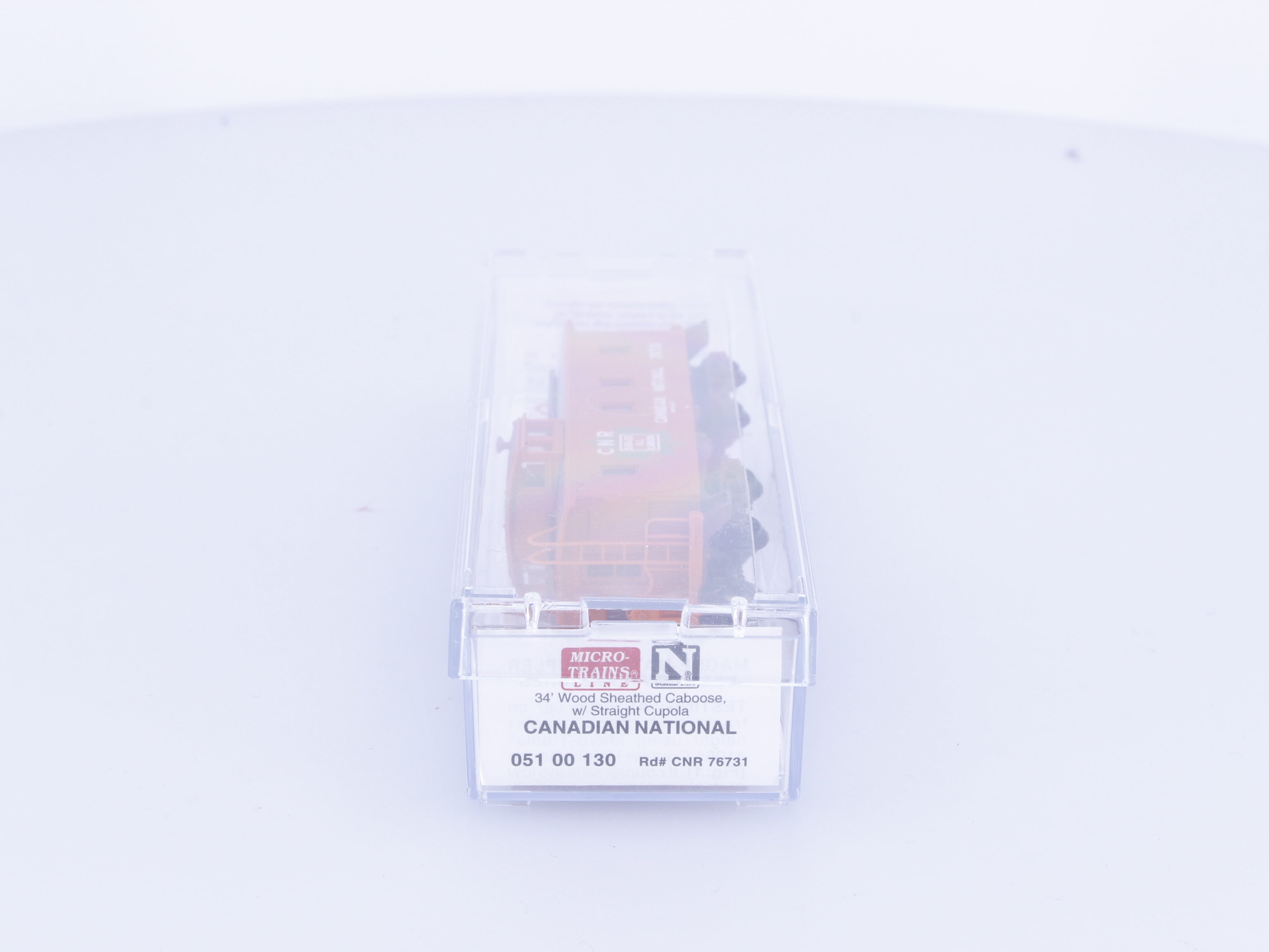Micro Trains 05100130 N 34' Wood Sheathed Caboose w/ Straight Cupola Canadian National (CN) 76731