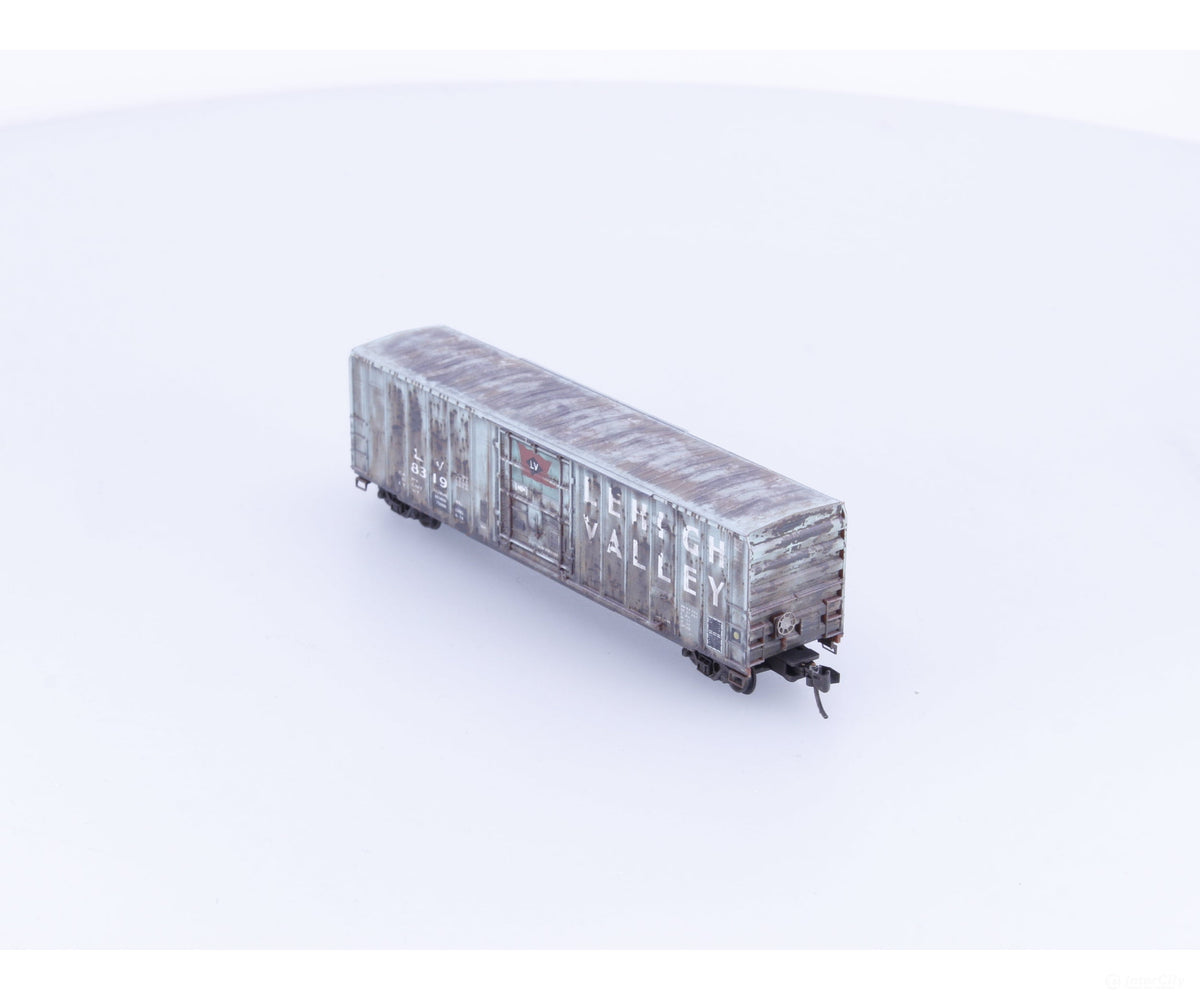 Micro Trains 02744520 N 50’ Rib Side Box Car Plug Door w/o Roofwalk Lehigh Valley Weathered Lehigh Valley (LV) 8319