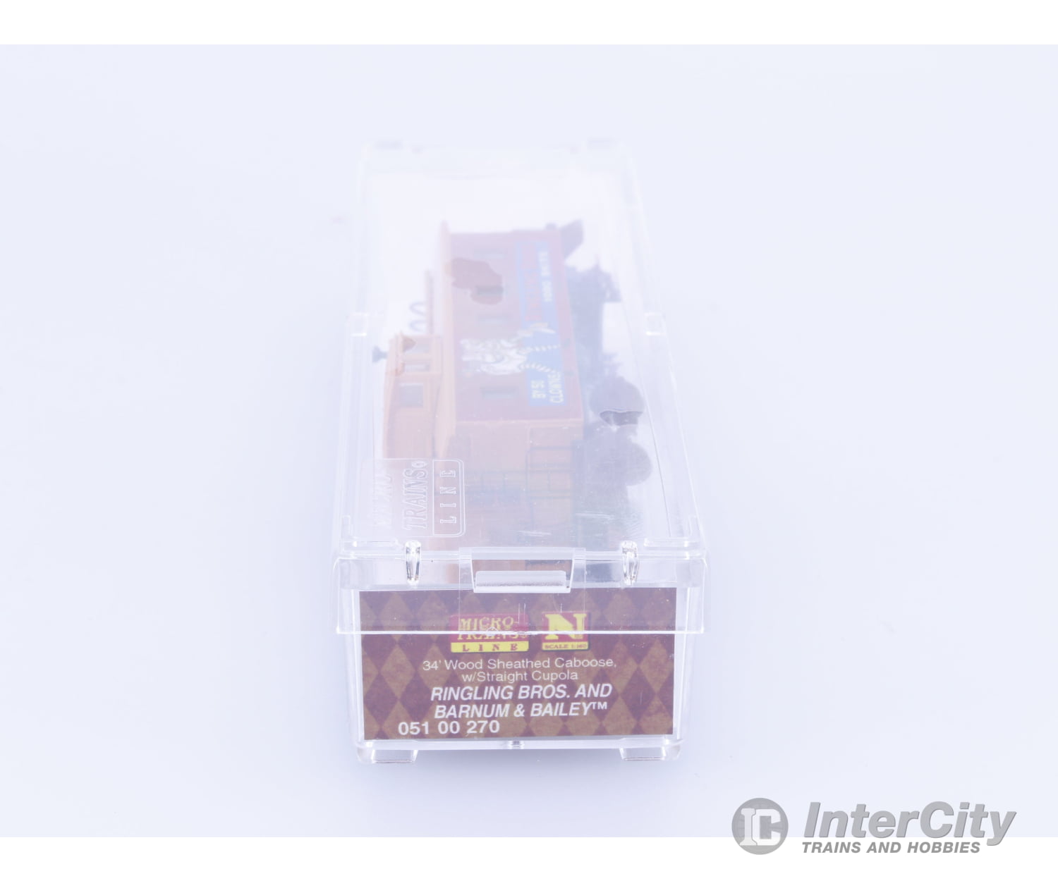 Micro Trains 05100270 N 34’ Wood Sheathed Caboose with Straight Sided Cupola Ringling Bros. and Barnum & Bailey (RBBX)