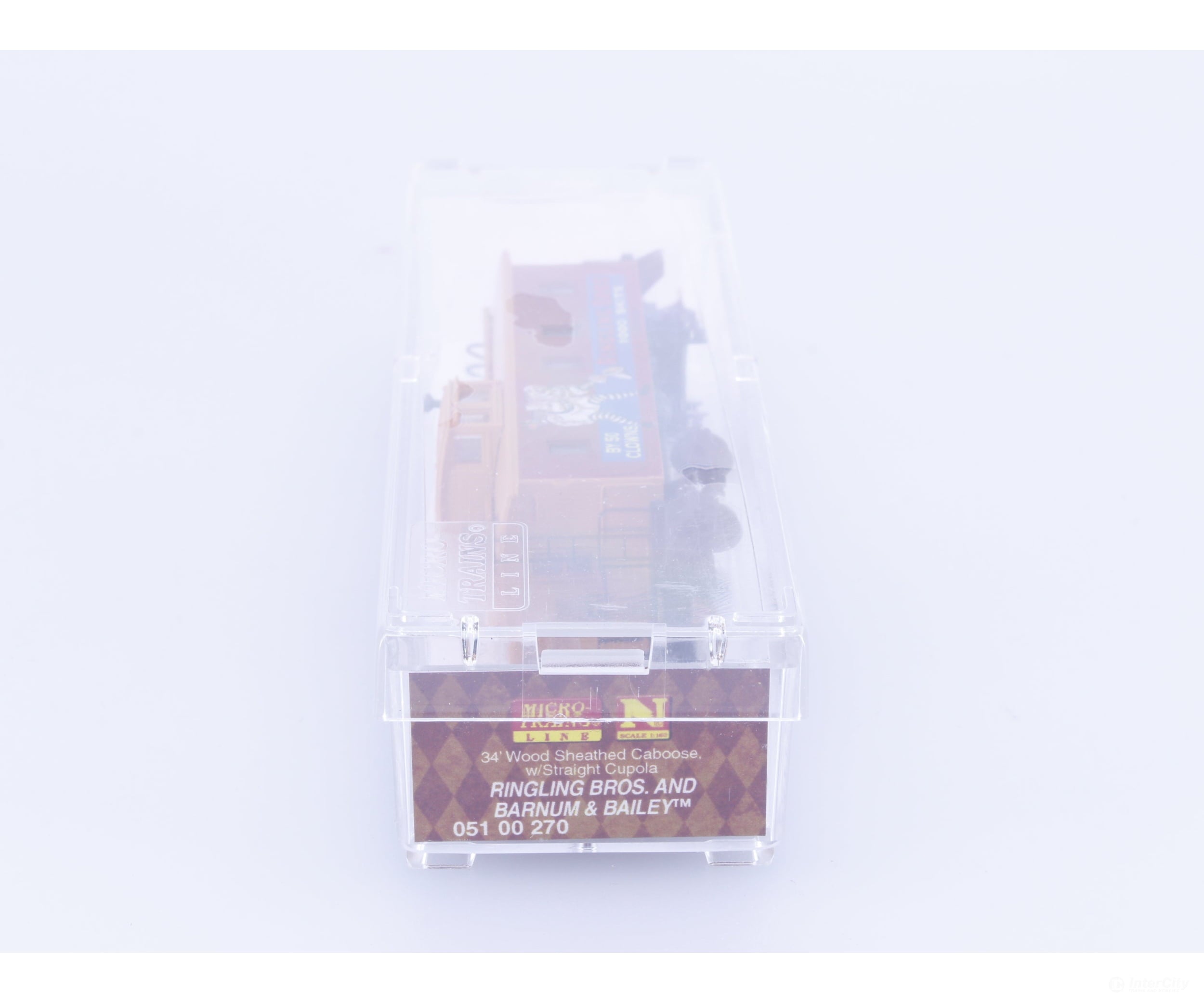 Micro Trains 05100270 N 34’ Wood Sheathed Caboose with Straight Sided Cupola Ringling Bros. and Barnum & Bailey (RBBX)