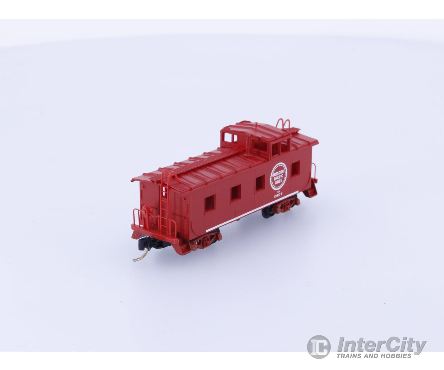 Micro Trains 100020 N 36’ Riveted Steel Side Caboose Missouri Pacific (MP) 13075 Freight Cars