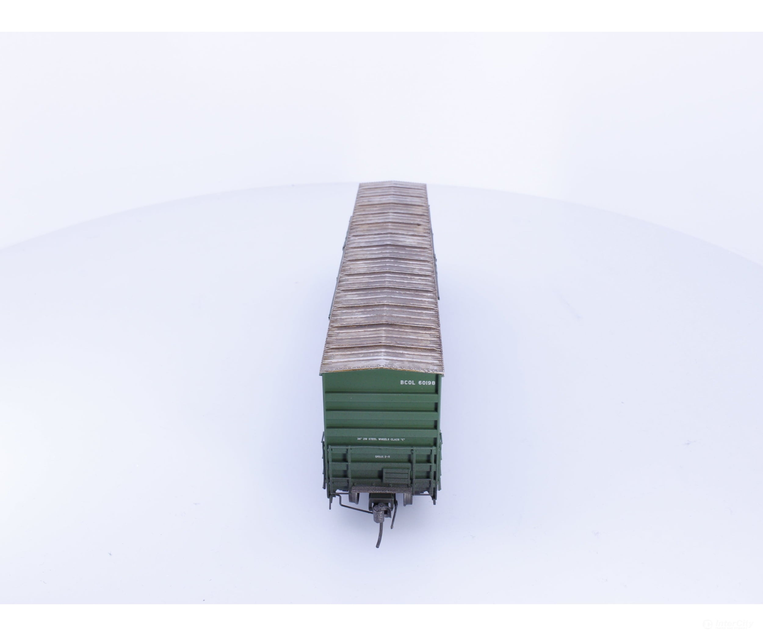 Rapido 191003A-WMT-H HO Trenton Works 6637cuft boxcar: BC Rail - faded w/conspicuity stripes #1 - Weathered by WEATHER