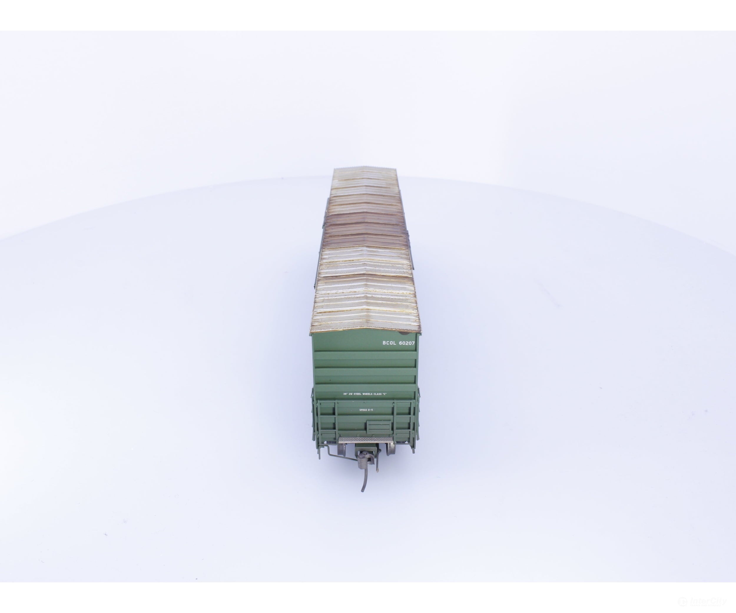 Rapido 191003A-WMT-M HO Trenton Works 6637cuft boxcar: BC Rail - faded w/conspicuity stripes #1 - Weathered by WEATHER