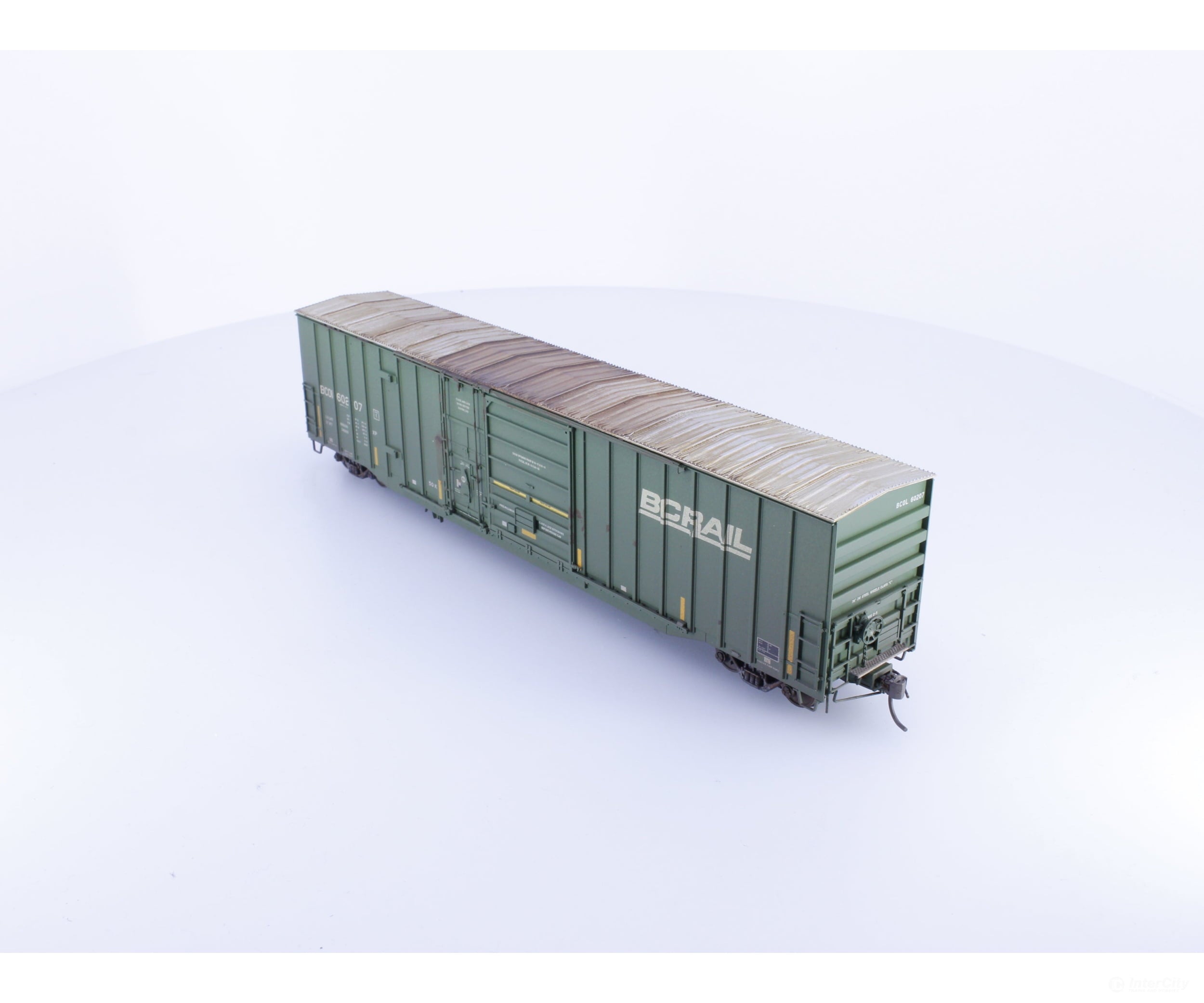 Rapido 191003A-WMT-M HO Trenton Works 6637cuft boxcar: BC Rail - faded w/conspicuity stripes #1 - Weathered by WEATHER