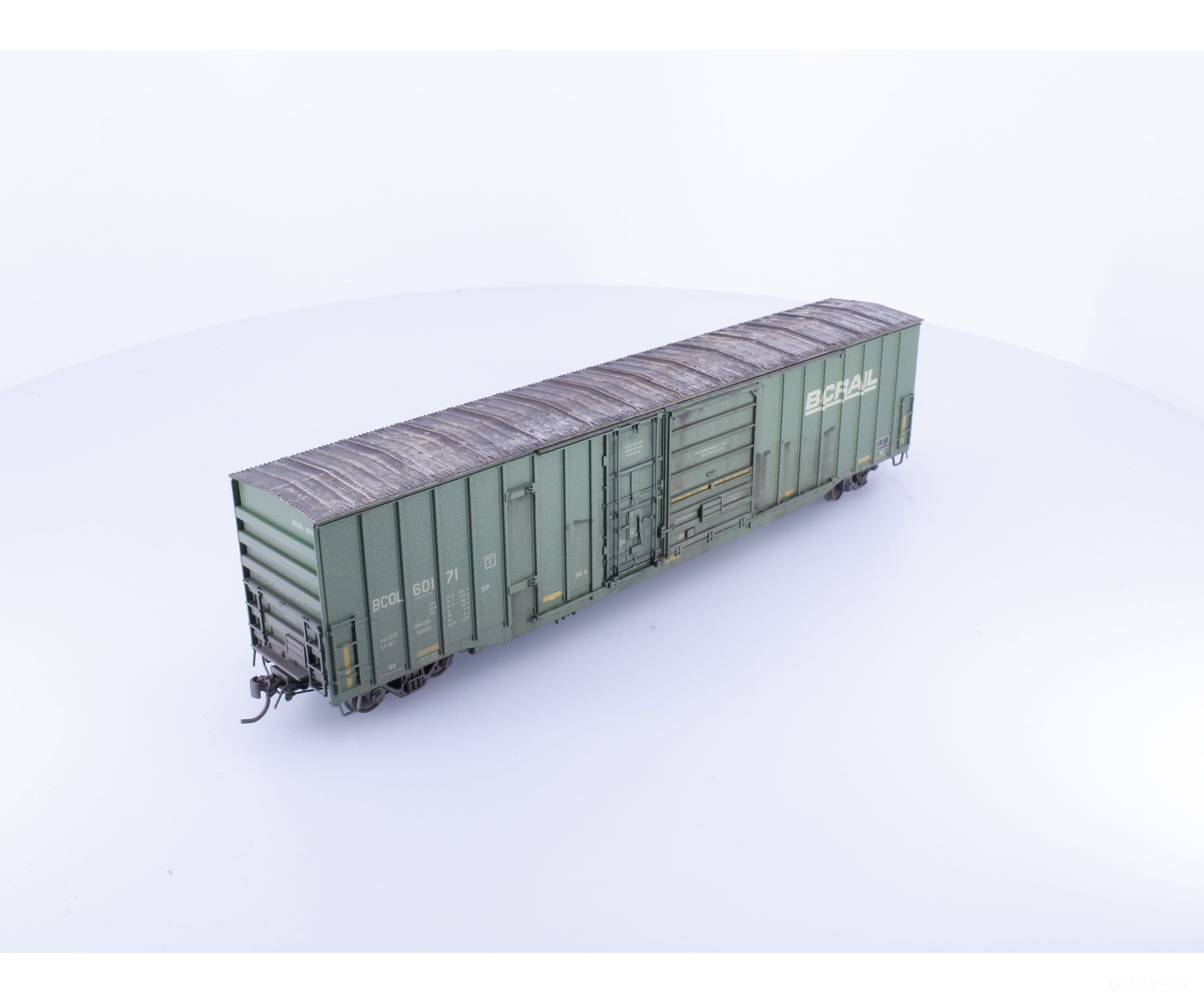 Rapido 191004A-WMT-H HO Trenton Works 6637cuft boxcar: BC Rail - faded w/conspicuity stripes faded #2 - Weathered by