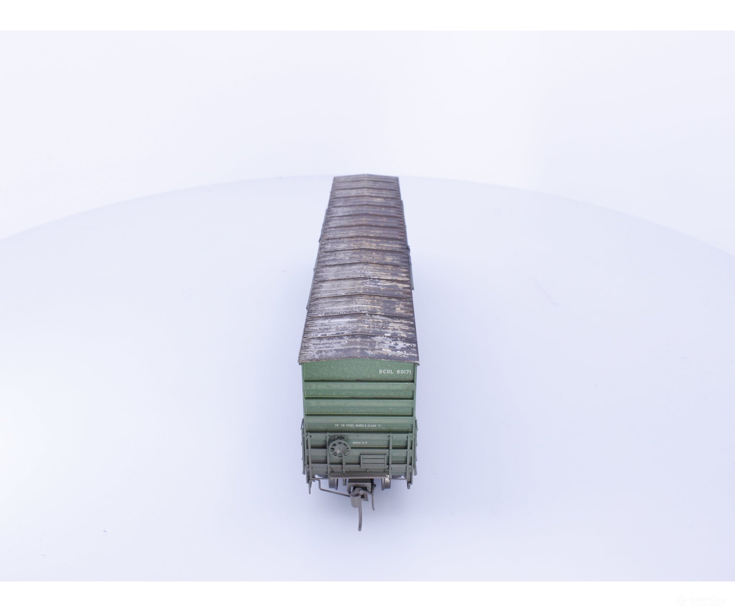 Rapido 191004A-WMT-H HO Trenton Works 6637cuft boxcar: BC Rail - faded w/conspicuity stripes faded #2 - Weathered by
