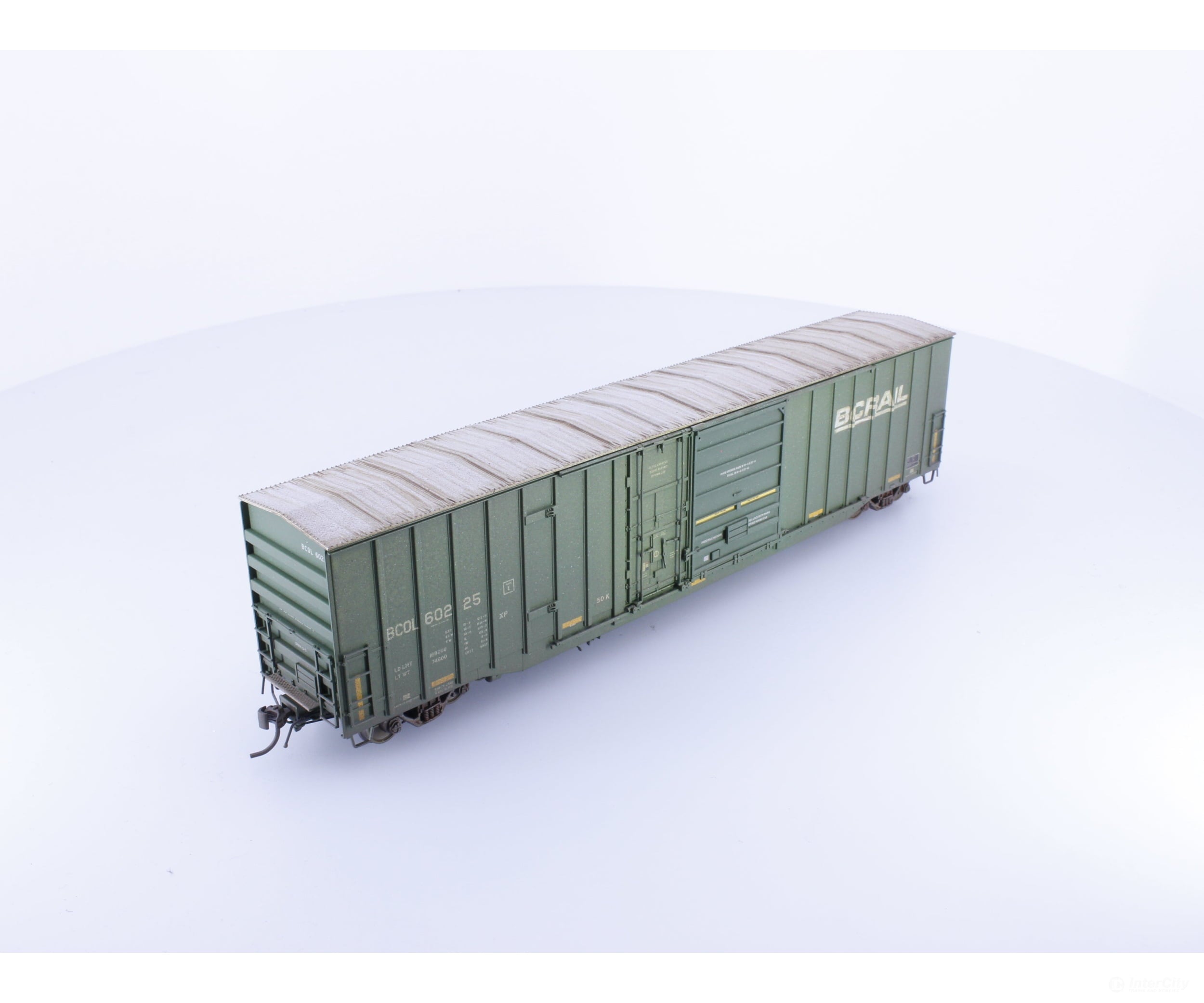 Rapido 191004A-WMT-M HO Trenton Works 6637cuft boxcar: BC Rail - faded w/conspicuity stripes faded #2 - Weathered by