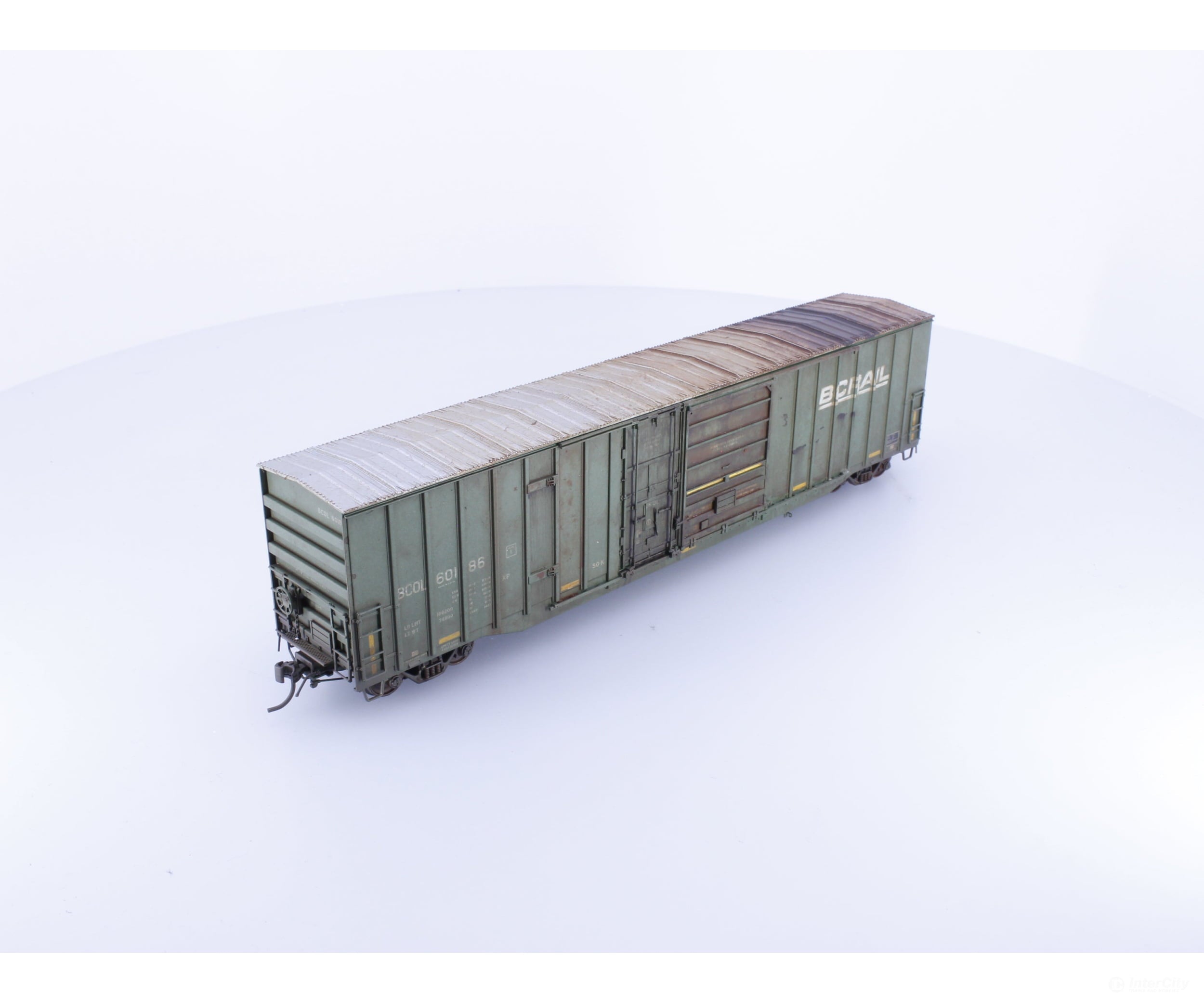 Rapido 191004A-WMT-XH HO Trenton Works 6637cuft boxcar: BC Rail - faded w/conspicuity stripes faded #2 - Weathered by