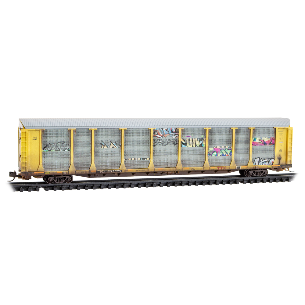 Micro Trains N 11144490 89' Tri-Level Enclosed Auto Rack - TTX TTGX #851005 (Weathered, silver, yellow, red logo, graffiti)