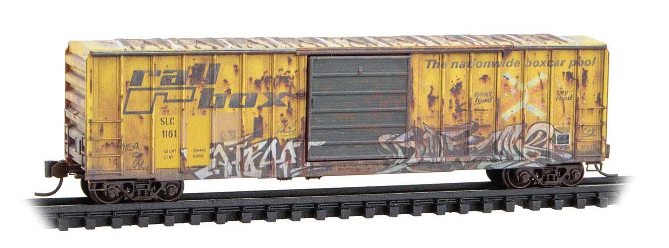 Micro Trains N 2544442 50' Rib-Side Single-Door Boxcar No Roofwalk - San Luis Central #1161 (Weathered, Ex-Railbox, yellow, graffiti, Series #6)