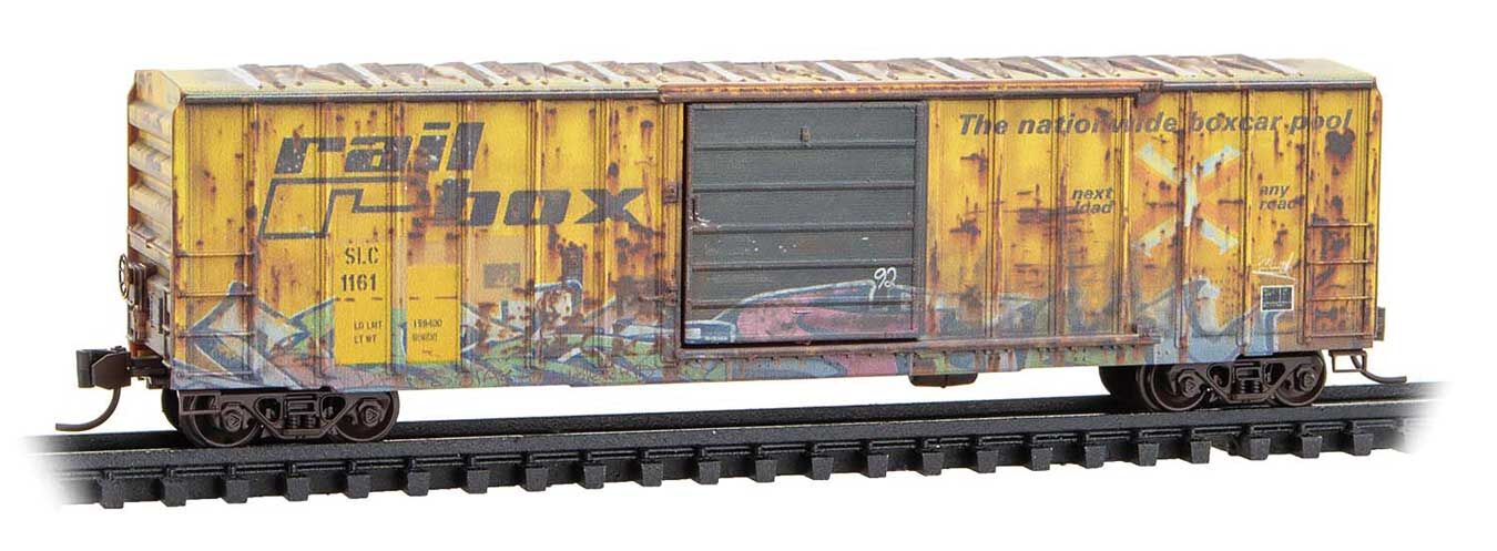 Micro Trains N 2544442 50' Rib-Side Single-Door Boxcar No Roofwalk - San Luis Central #1161 (Weathered, Ex-Railbox, yellow, graffiti, Series #6)