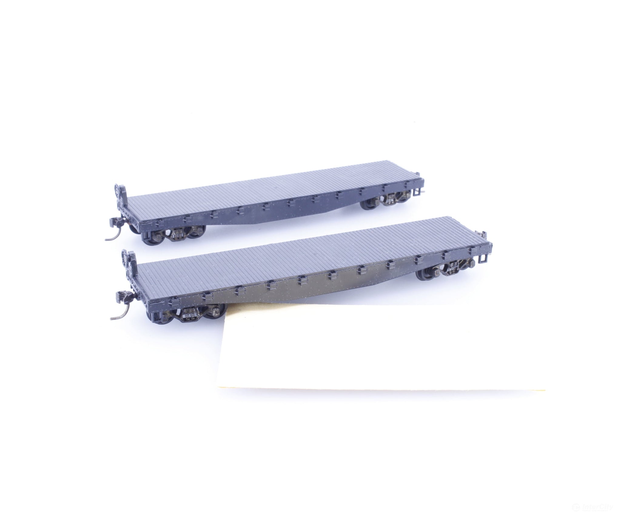 Athearn 1349 HO Two 40’ Flatcars with Stakes Undecorated - Freight Cars
