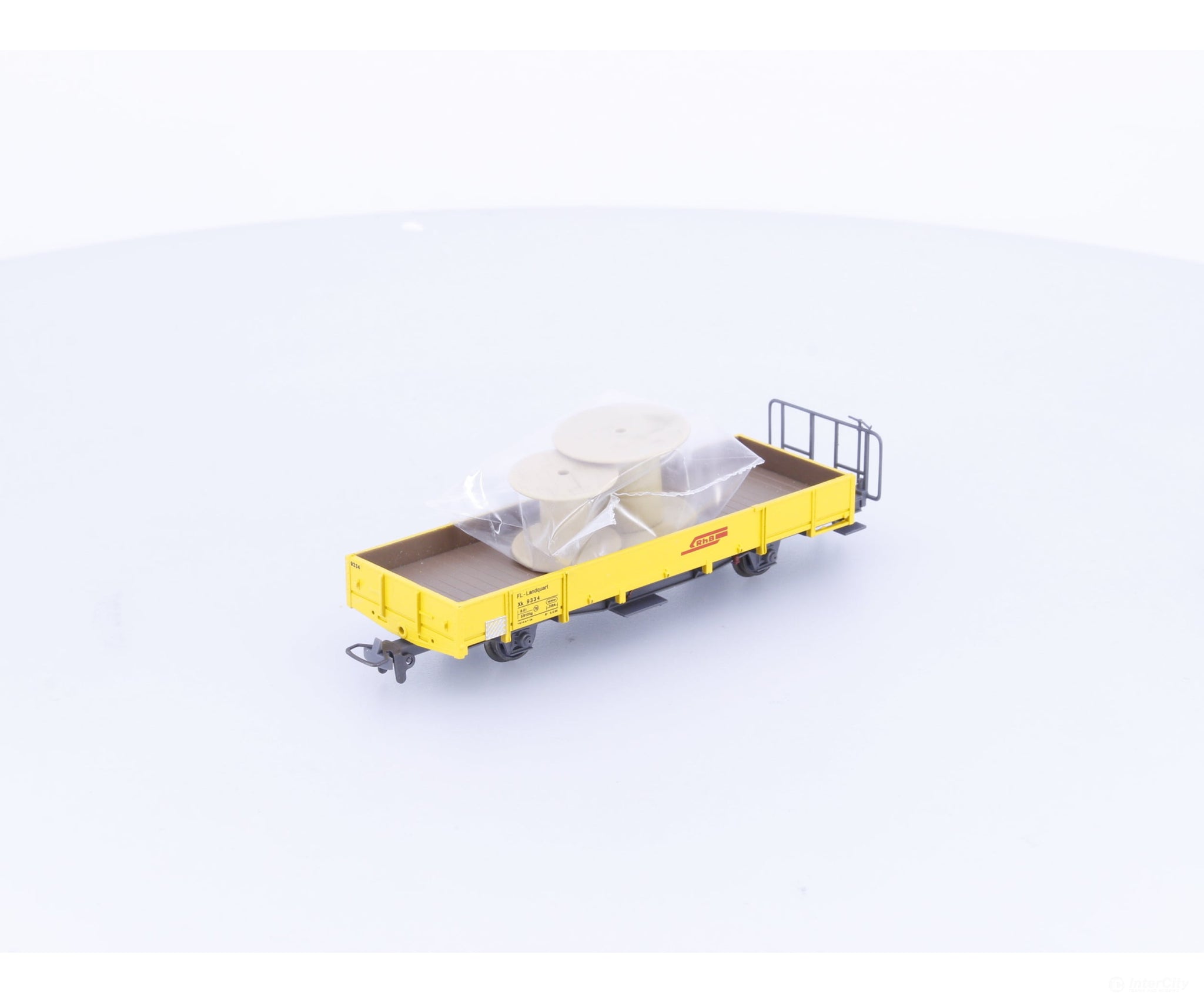 Bemo 2268104 HOm RhB Low Side Flat Car with Load Xk9334 - European Freight Cars