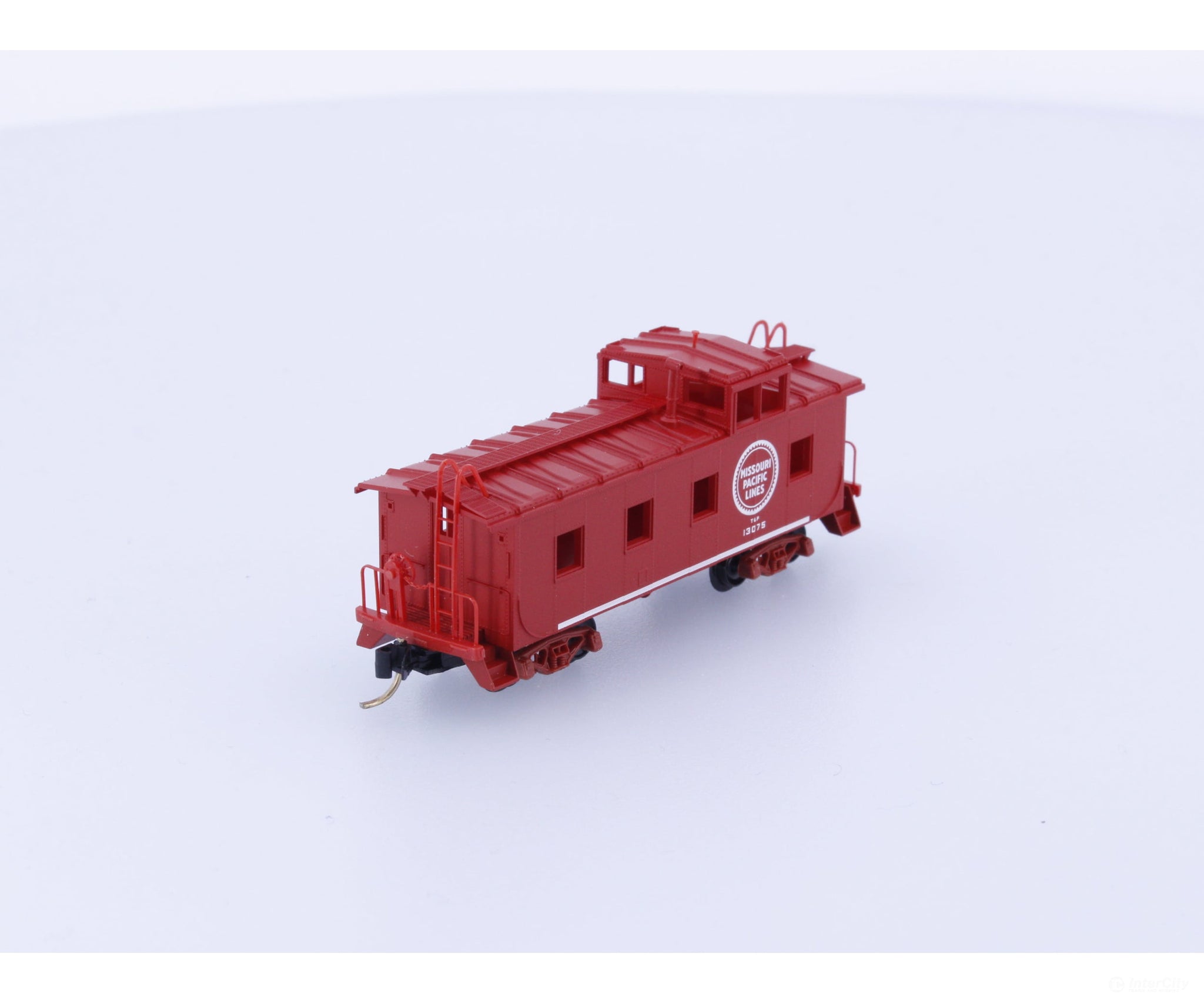 Micro Trains 100020 N 36’ Riveted Steel Side Caboose Missouri Pacific (MP) 13075 Freight Cars