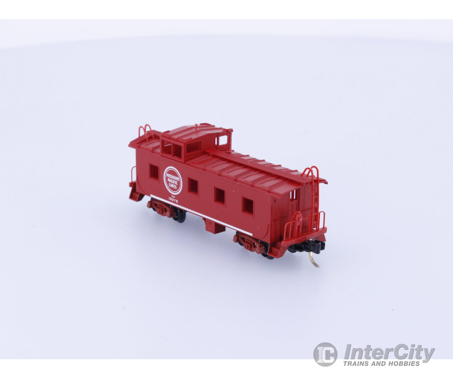 Micro Trains 100020 N 36’ Riveted Steel Side Caboose Missouri Pacific (MP) 13075 Freight Cars
