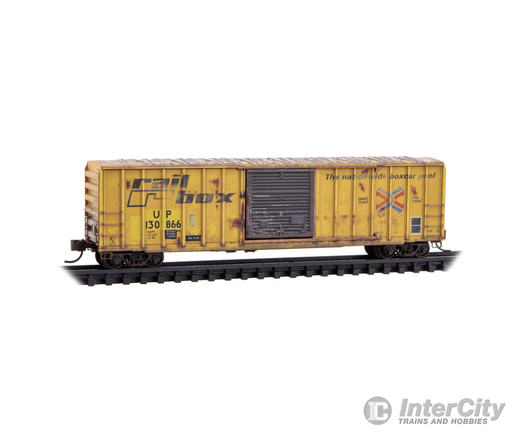 Micro Trains N 02544437 50’ Rib-Side Boxcar Plug Door No Roofwalk - UP ex-Railbox Weathered Freight Cars