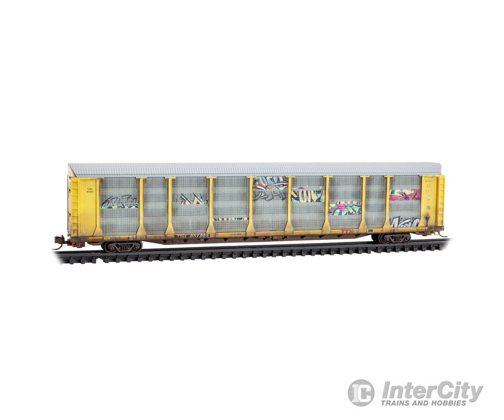 Micro Trains N 11144490 89’ Tri-Level Enclosed Auto Rack - TTX TTGX #851005 (Weathered silver yellow red logo graffiti)