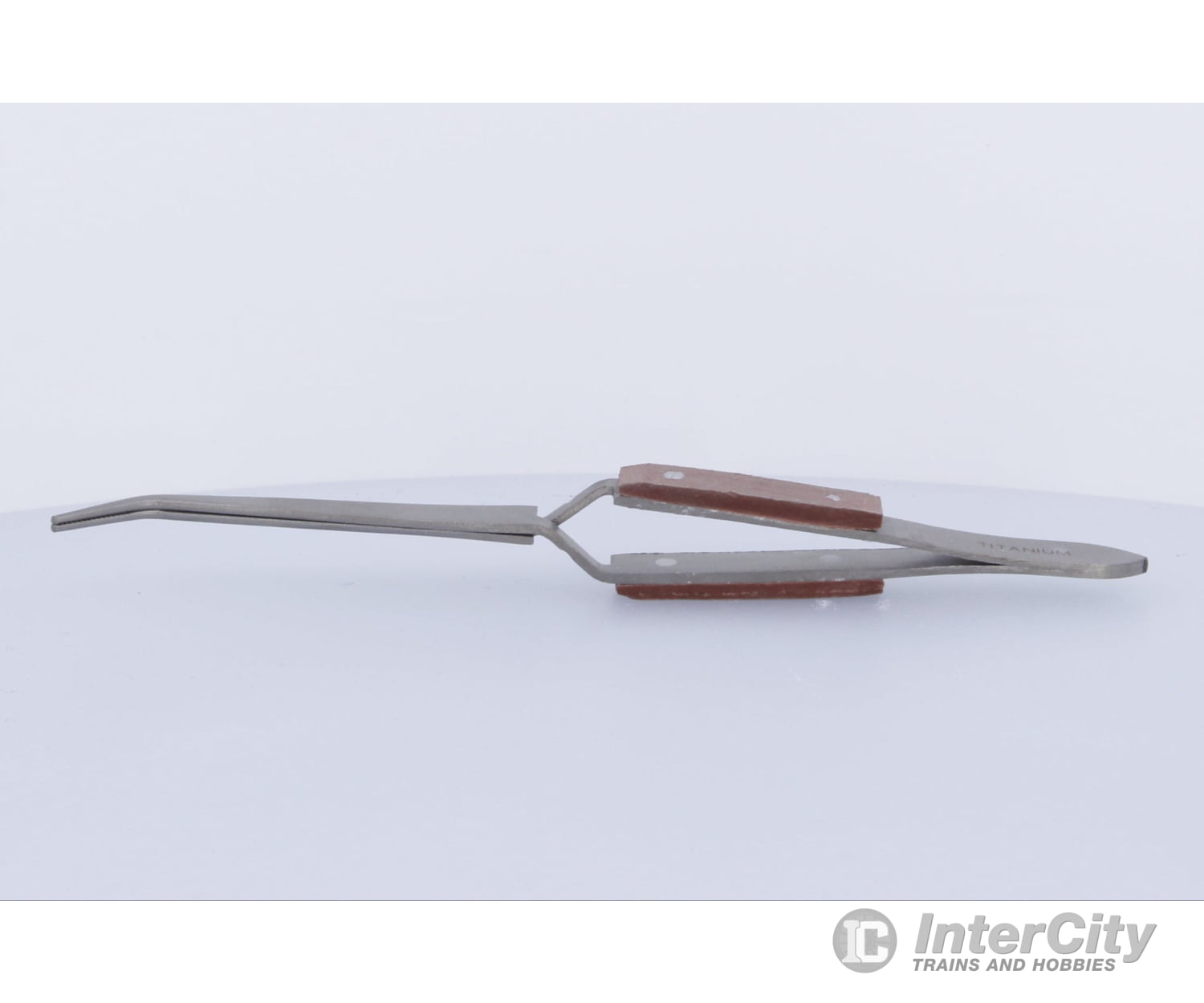 Press To Open Tweezers - Titanium Finish Curved Tools