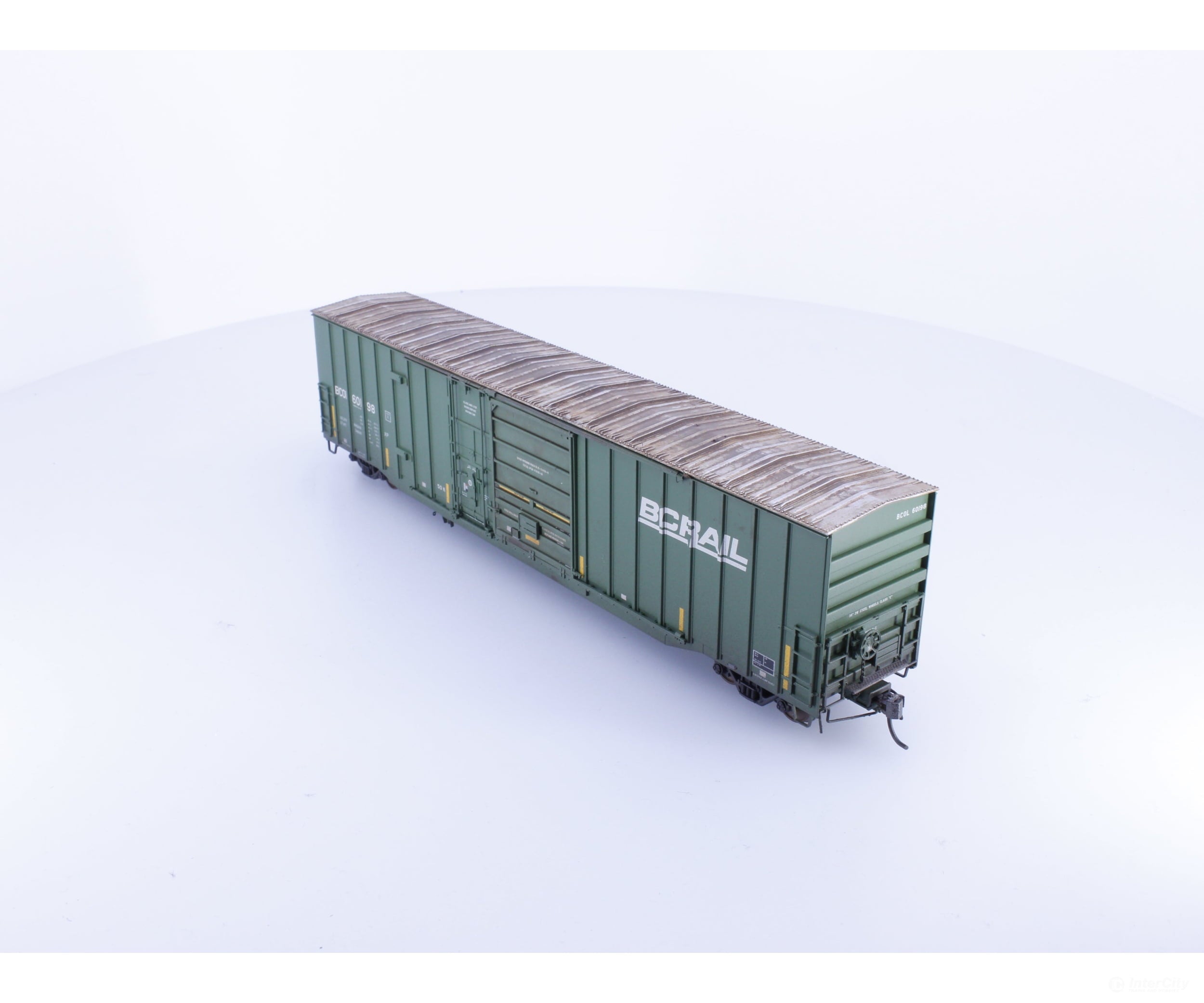 Rapido 191003A-WMT-H HO Trenton Works 6637cuft boxcar: BC Rail - faded w/conspicuity stripes #1 - Weathered by WEATHER