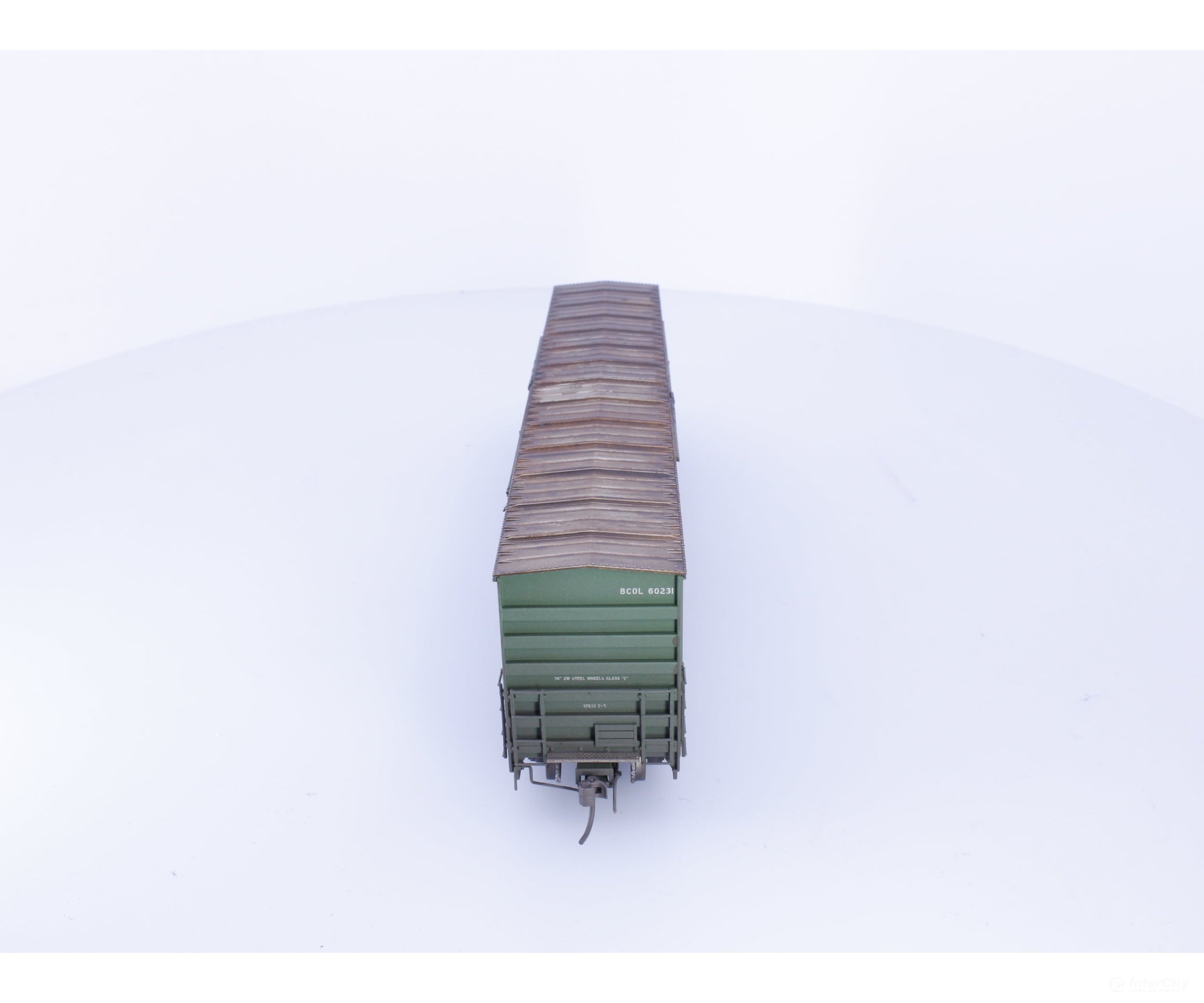 Rapido 191003A-WMT-XH HO Trenton Works 6637cuft boxcar: BC Rail - faded w/conspicuity stripes #1 - Weathered by WEATHER
