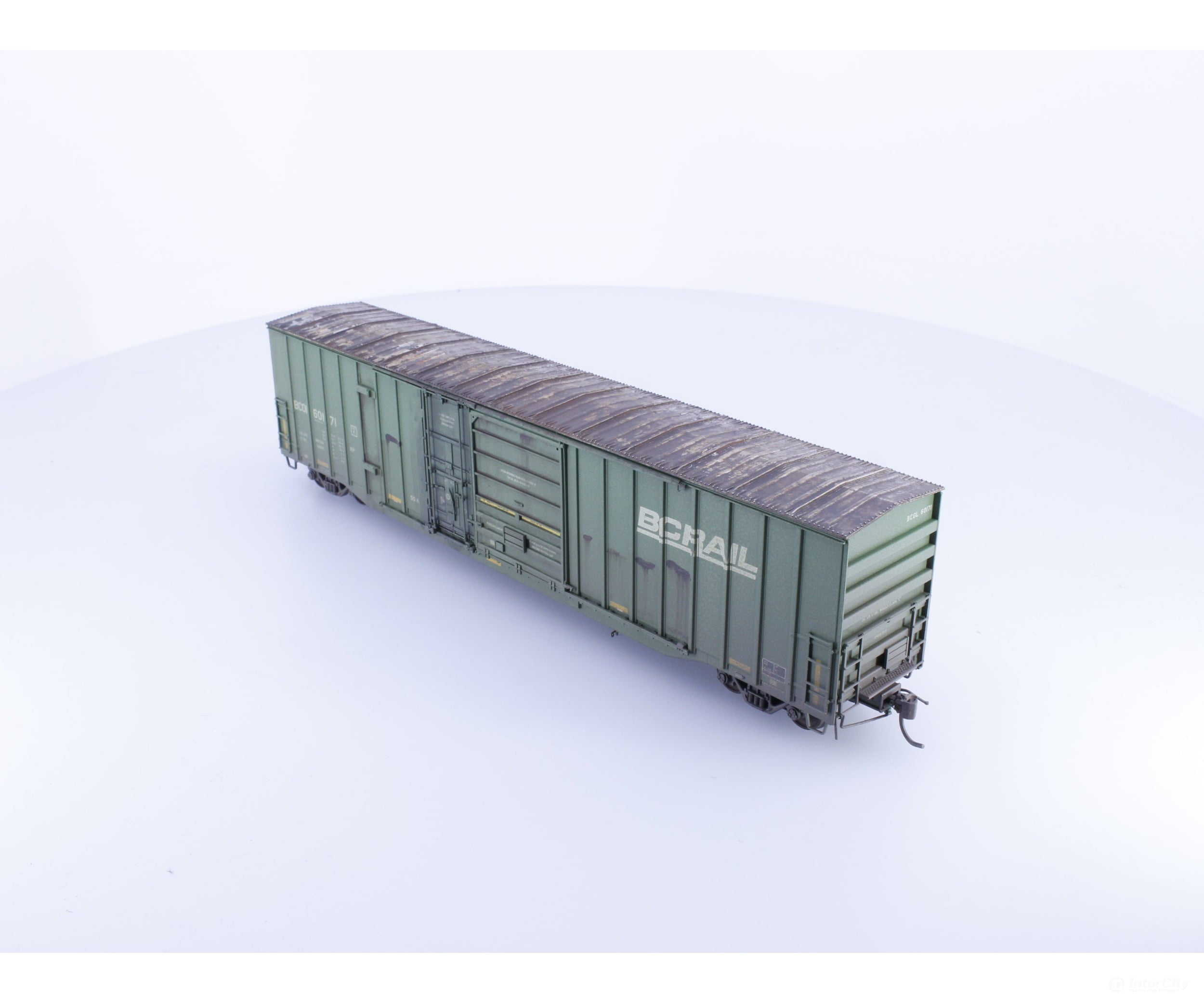 Rapido 191004A-WMT-H HO Trenton Works 6637cuft boxcar: BC Rail - faded w/conspicuity stripes faded #2 - Weathered by