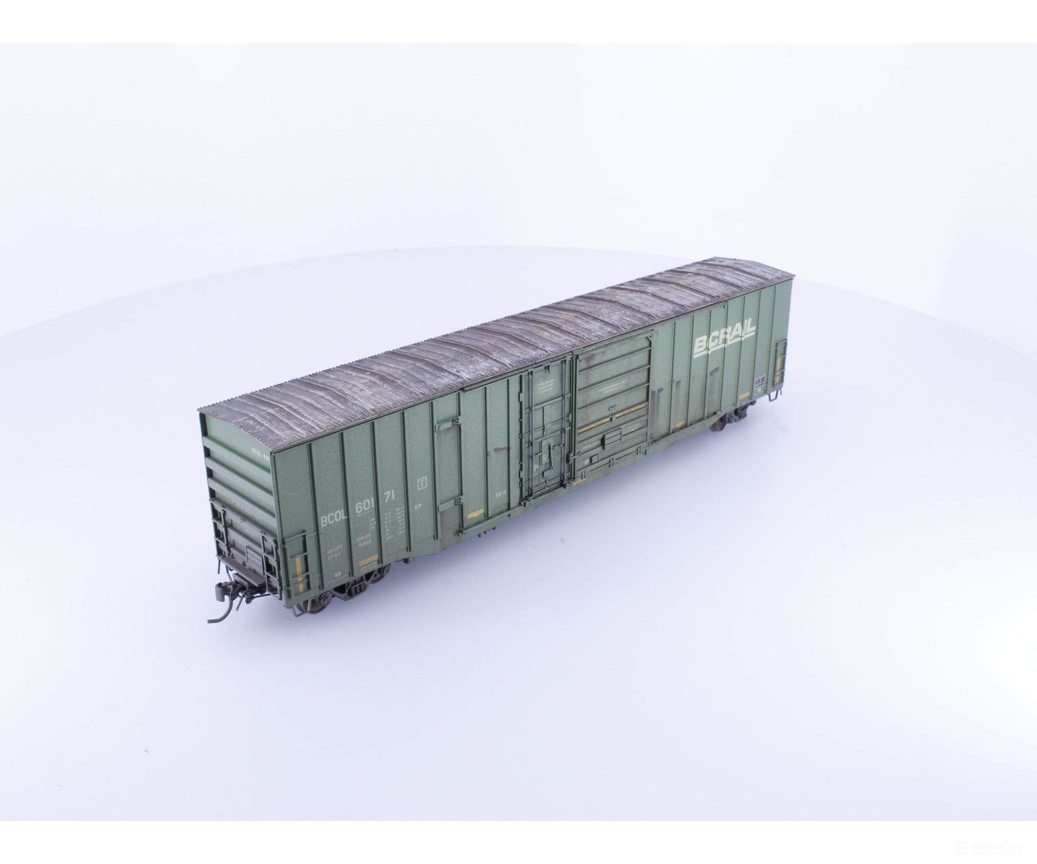 Rapido 191004A-WMT-H HO Trenton Works 6637cuft boxcar: BC Rail - faded w/conspicuity stripes faded #2 - Weathered by