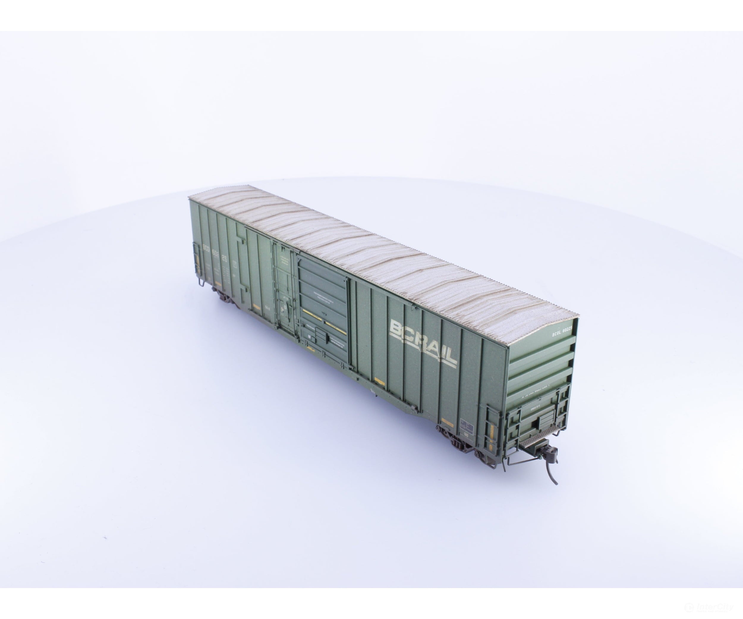 Rapido 191004A-WMT-M HO Trenton Works 6637cuft boxcar: BC Rail - faded w/conspicuity stripes faded #2 - Weathered by
