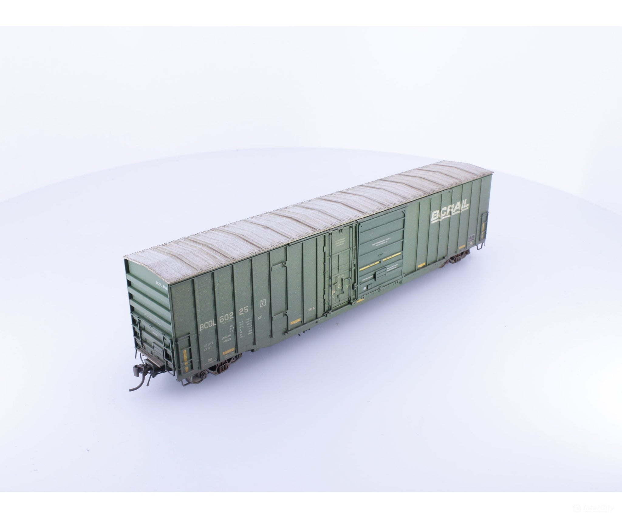 Rapido 191004A-WMT-M HO Trenton Works 6637cuft boxcar: BC Rail - faded w/conspicuity stripes faded #2 - Weathered by