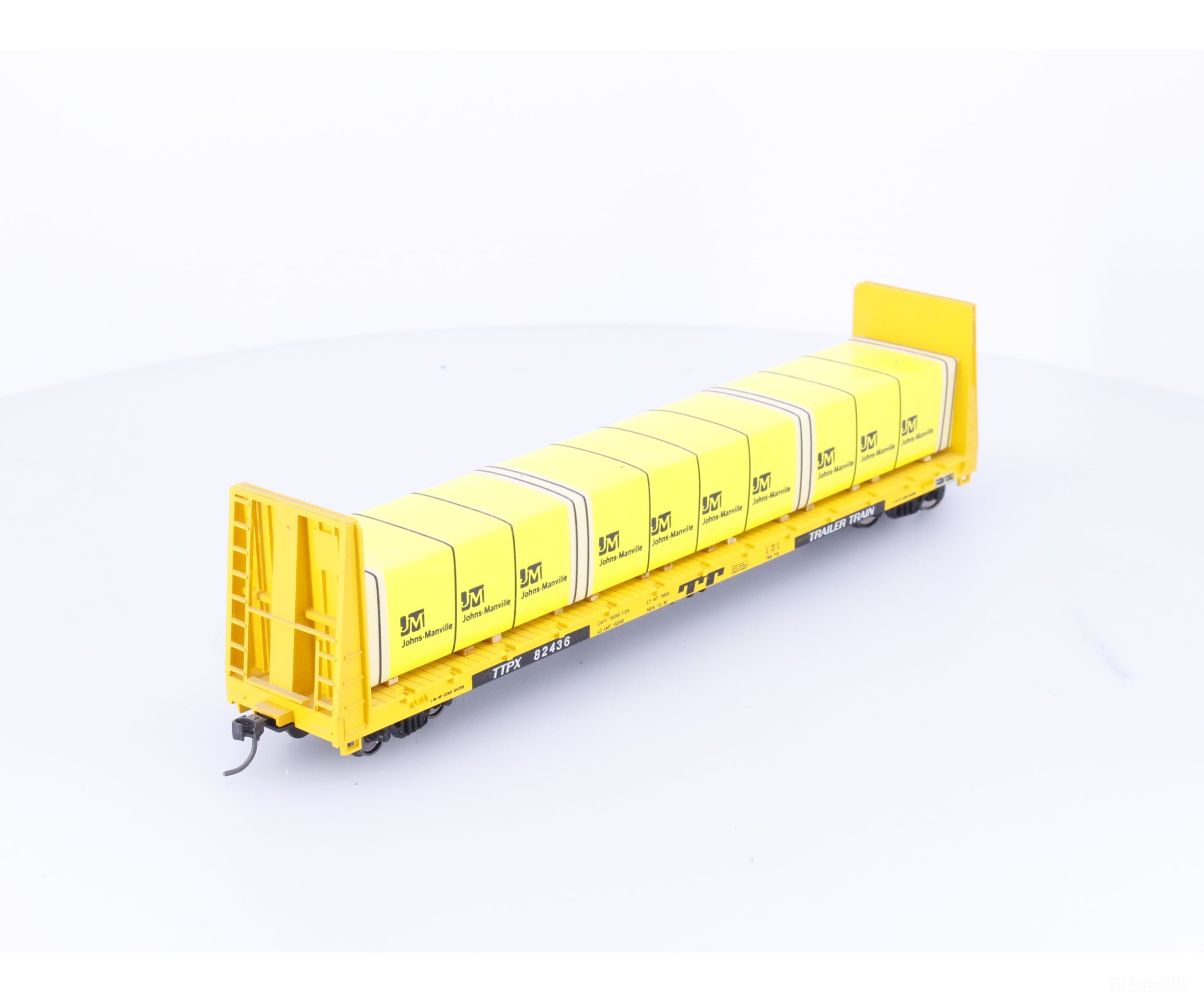 Roundhouse 1301 HO 60’ Bulkhead Flat Car with Johns Manville Lumber Load (TTPX) Trailer Train TTX Corp. (TTX) 82436