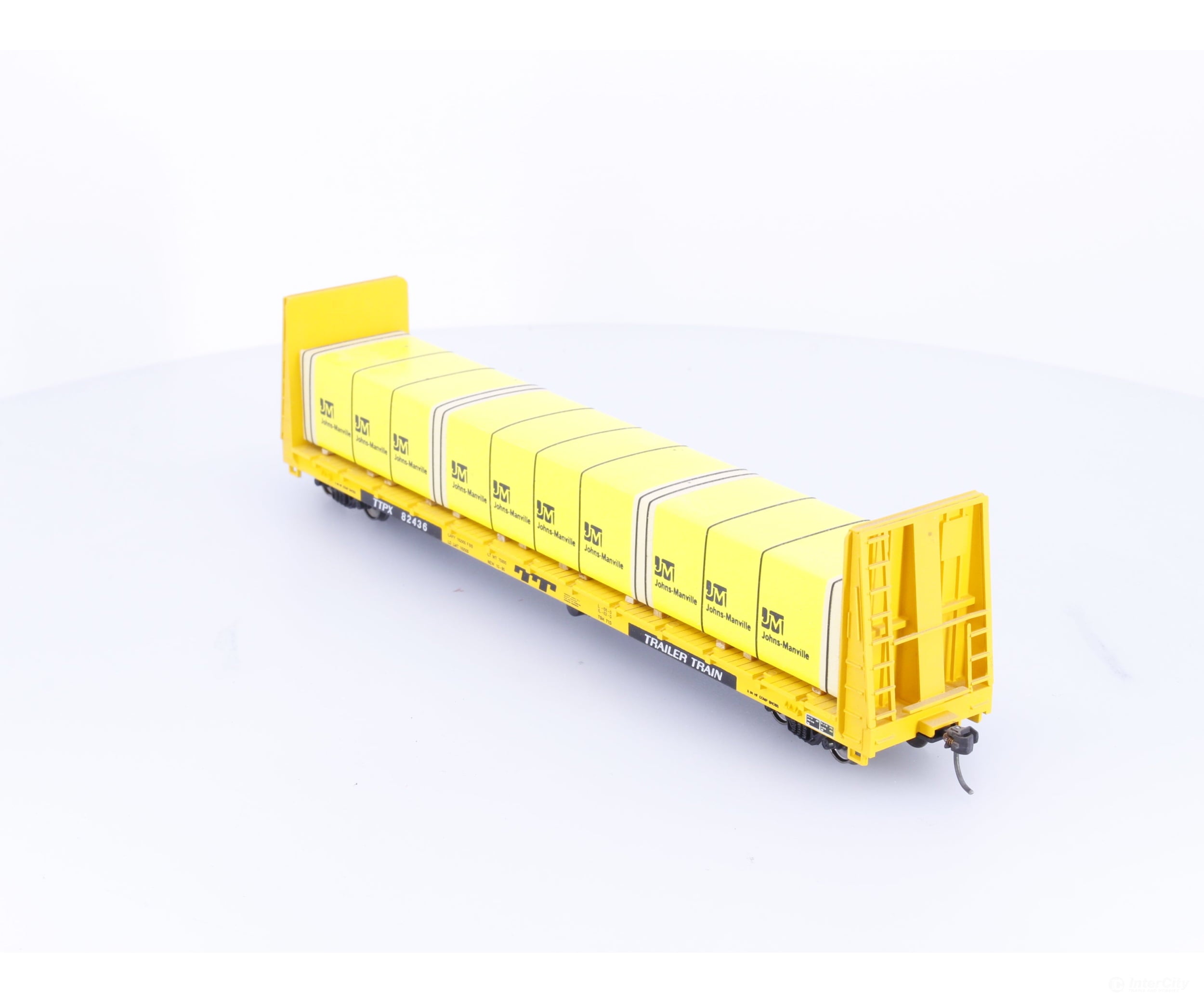Roundhouse 1301 HO 60’ Bulkhead Flat Car with Johns Manville Lumber Load (TTPX) Trailer Train TTX Corp. (TTX) 82436