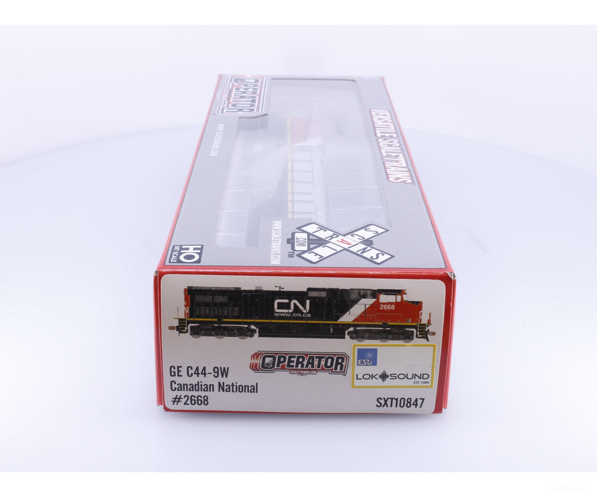 ScaleTrains SXT10847 HO GE C44-9W Dash 9 Diesel Locomotive ESU Loksound Canadian National (CN) 2668 DCC & Sound
