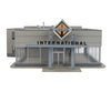 Walthers Cornerstone 4025 International Truck Dealership -- Kit - 8-7/8 X 12-1/4 3-7/8’ 22 31.1