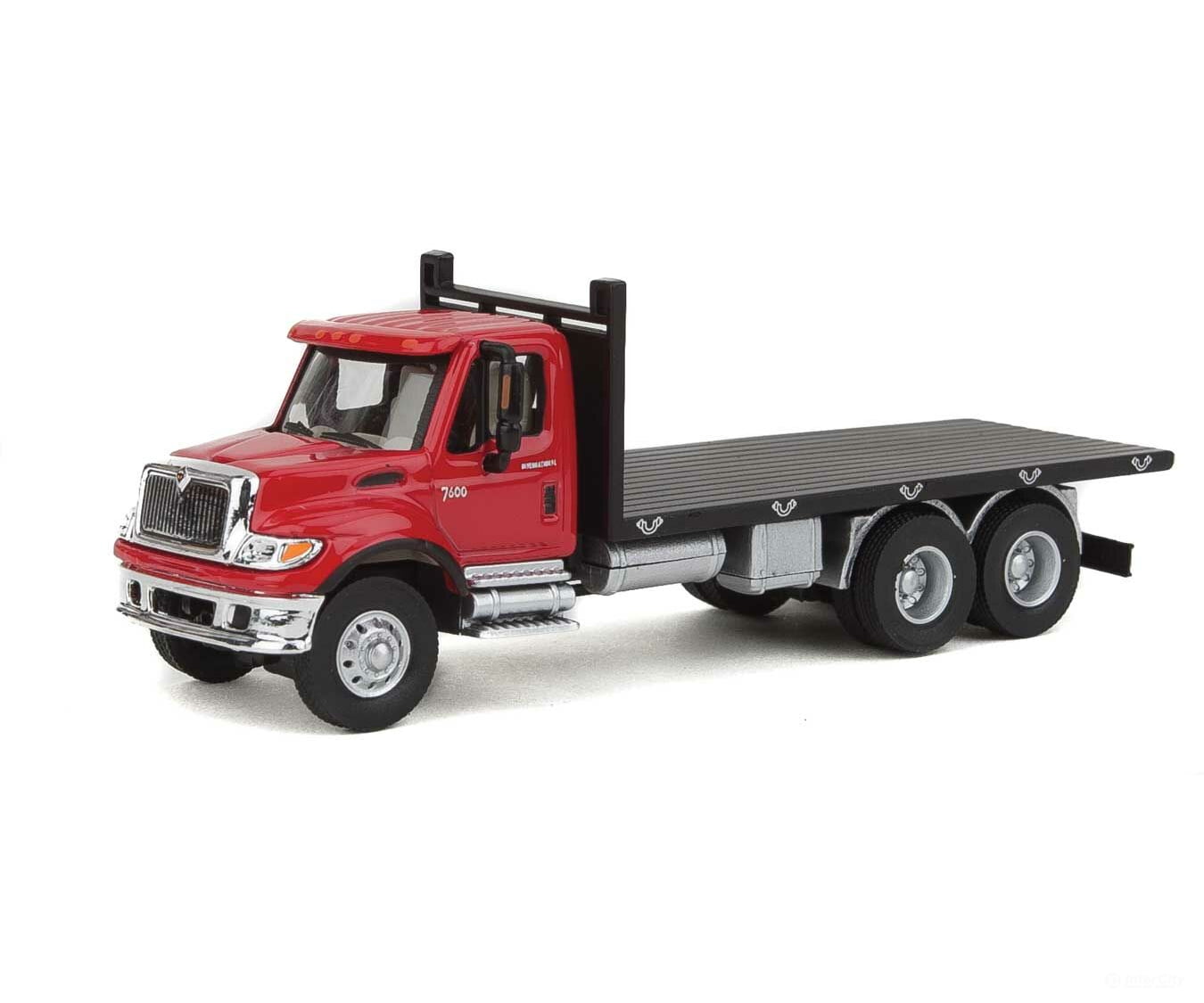 Walthers Scenemaster 11652 International(R) 7600 3-Axle Flatbed Truck - Assembled -- Red Cab Black