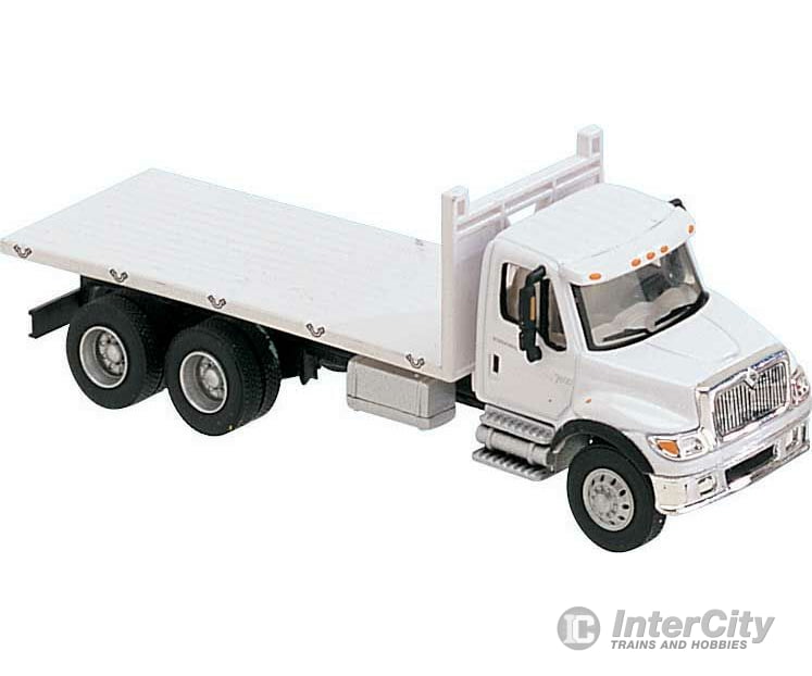 Walthers Scenemaster 11650 International(R) 7600 3-Axle Flatbed Truck - Assembled -- White With