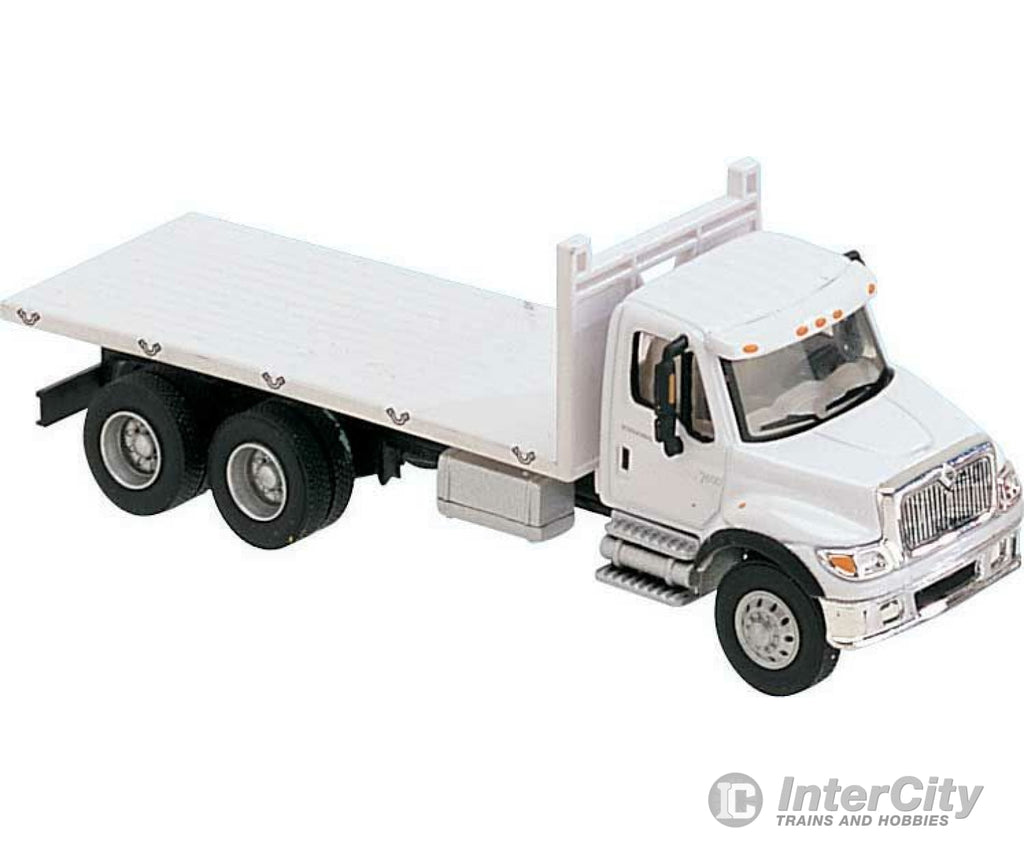 Walthers Scenemaster 11650 International(R) 7600 3-Axle Flatbed Truck - Assembled -- White With