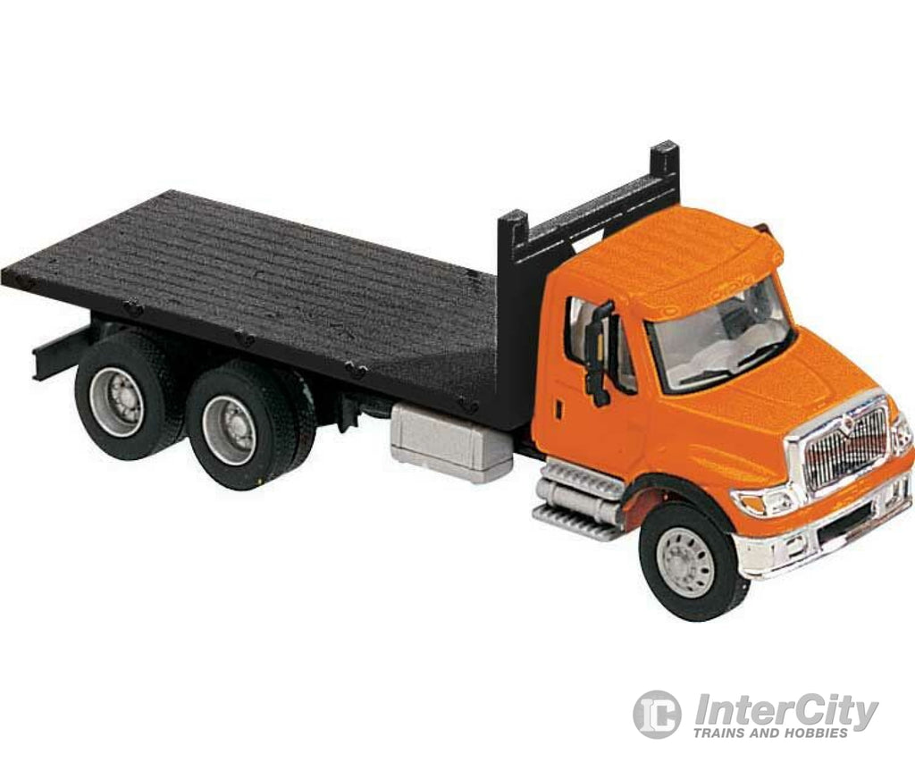 Walthers Scenemaster 11651 International(R) 7600 3-Axle Flatbed Truck - Assembled -- Orange Cab