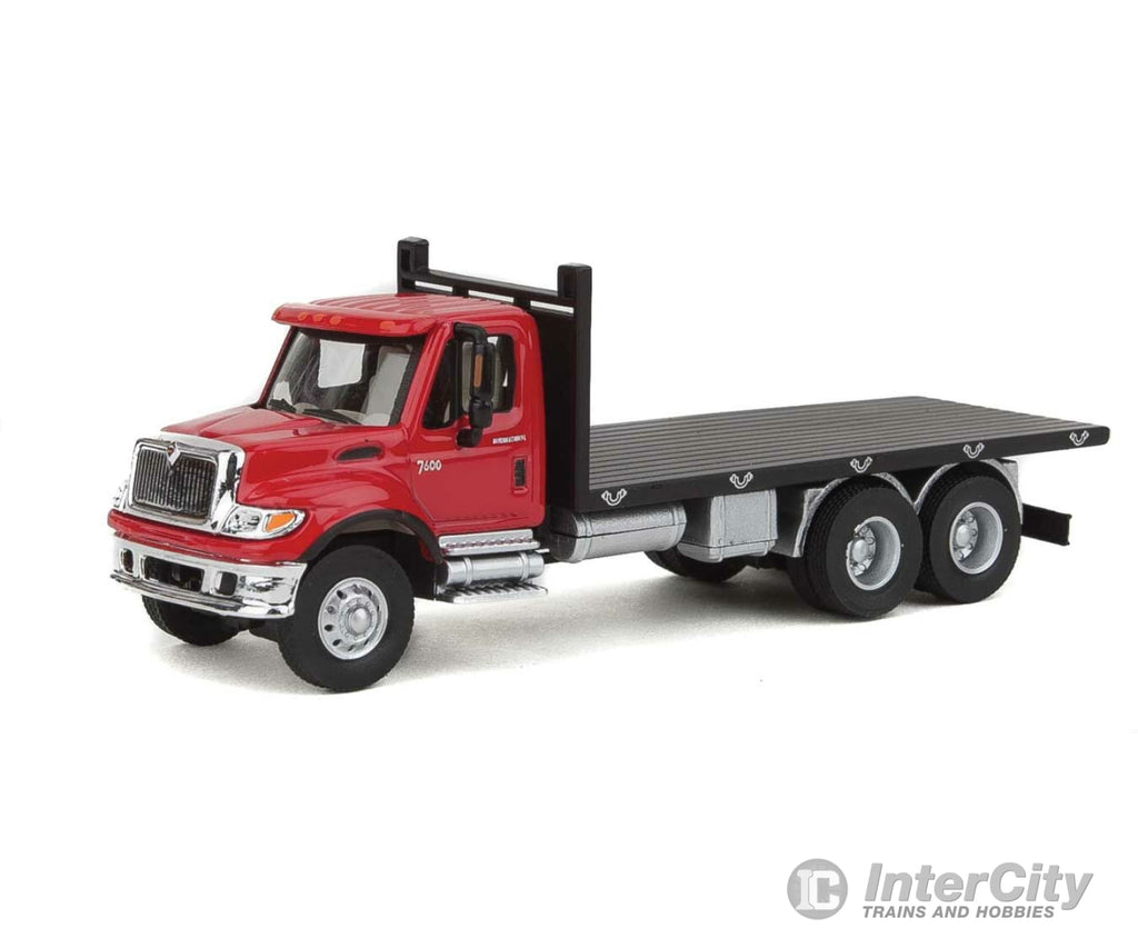 Walthers Scenemaster 11652 International(R) 7600 3-Axle Flatbed Truck - Assembled -- Red Cab Black