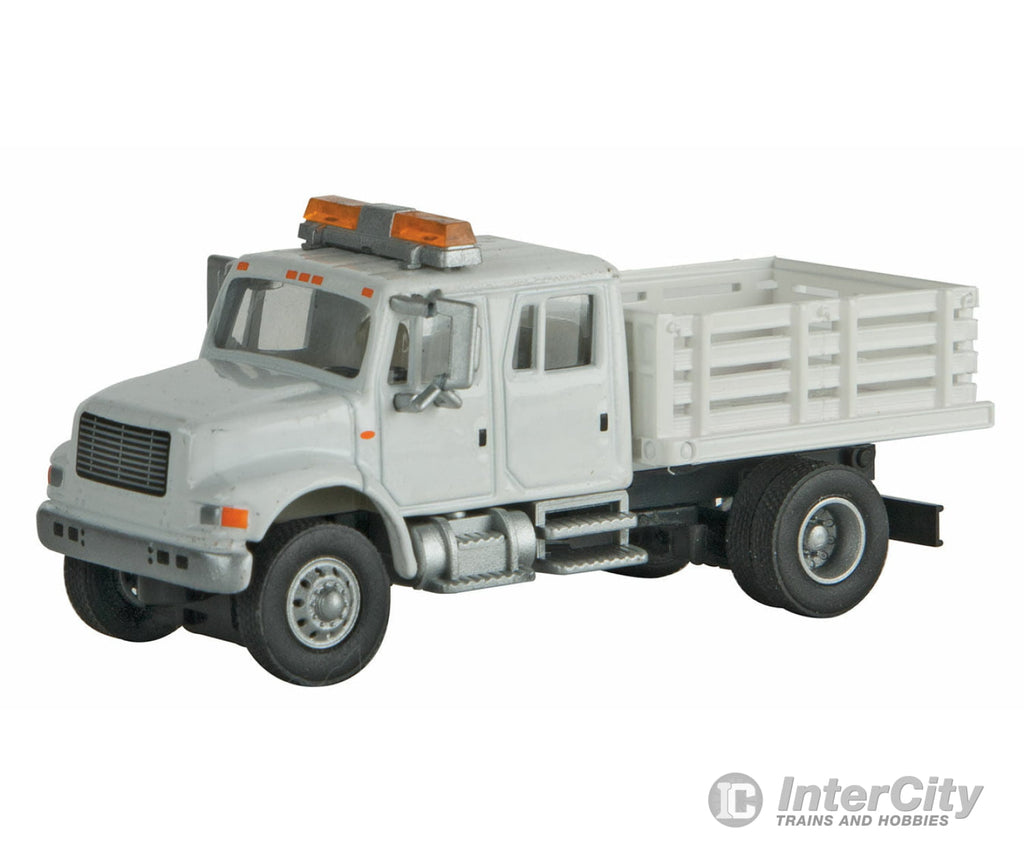 Walthers Scenemaster 11894 International(R) 4900 Open Stake Bed Utility Truck - Assembled -- White